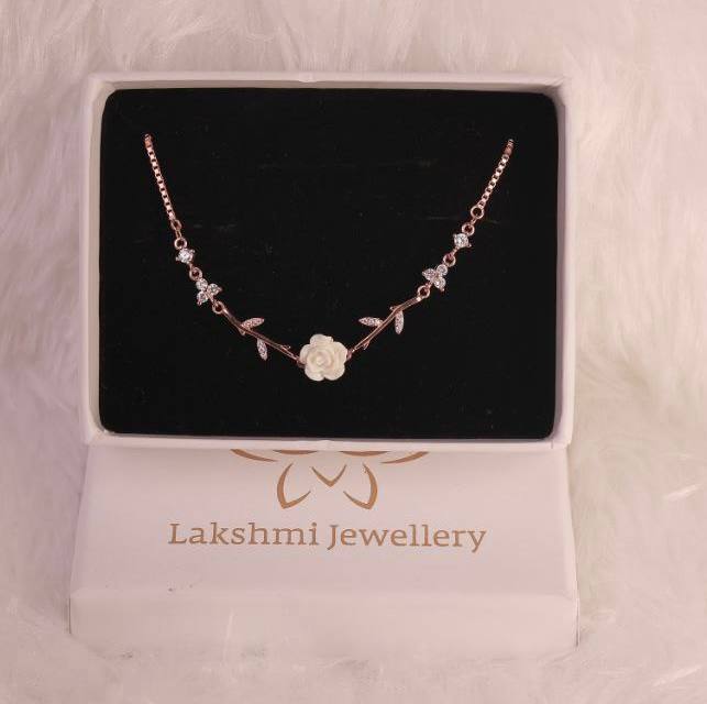 Silver flower1 bracelet with rosegold finish