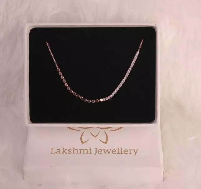 Silver dotted bracelet with rosegold finish