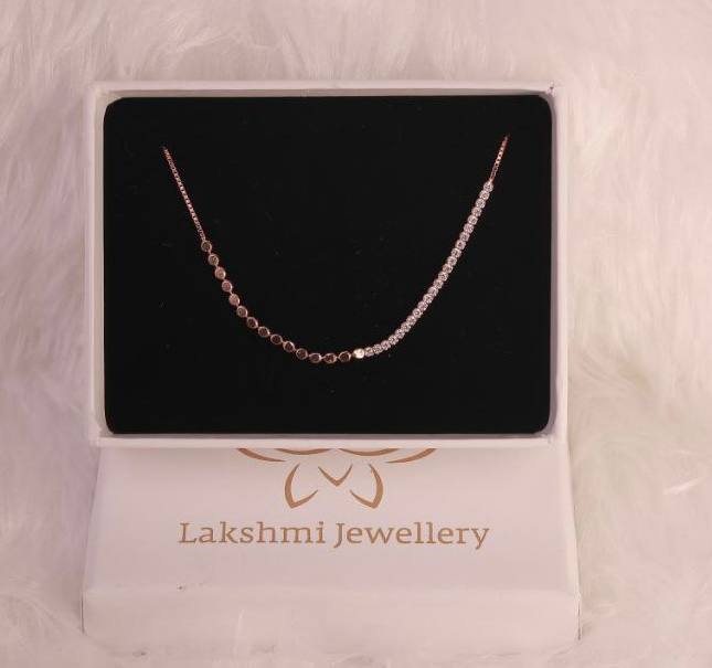 Silver dotted bracelet with rosegold finish