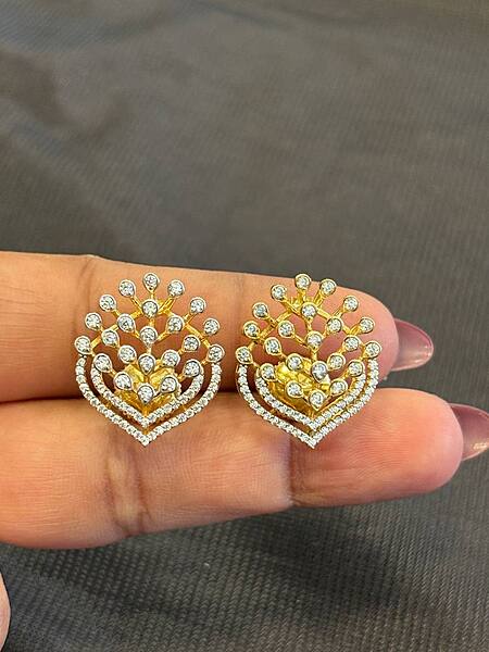 Silver feathers stud with gold finish