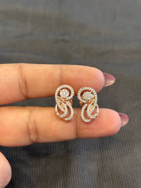 Silver flower twisted stud with rosegold finish