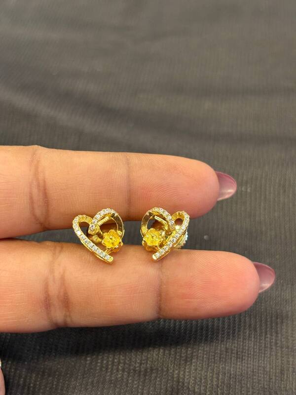 Silver yazhini stud with gold finish