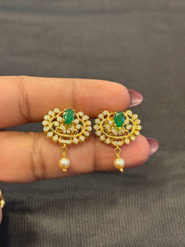 Silver yazhisai stud with gold finish