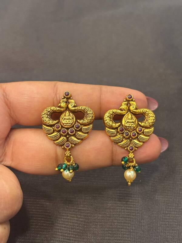 Silver double peacock stud with antique finish