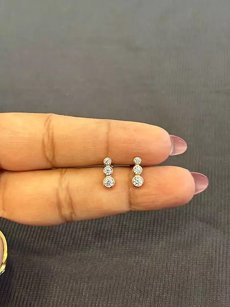 Silver three stone1 stud with rosegold finish