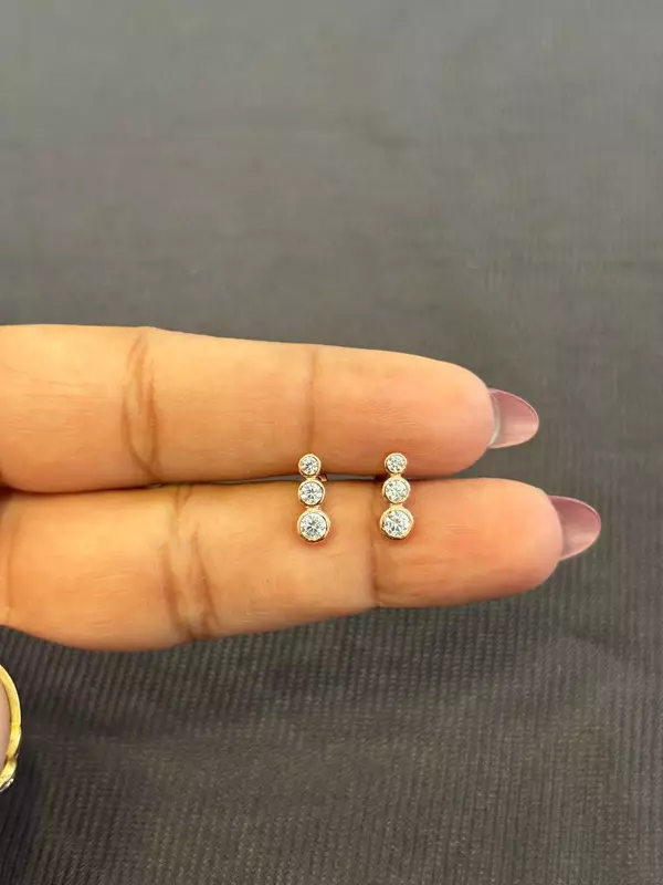 Silver three stone1 stud with rosegold finish