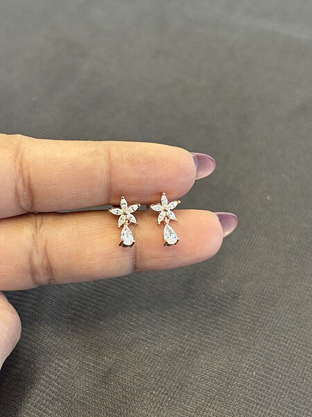 Silver white nakshtra droplet with rosegold finish