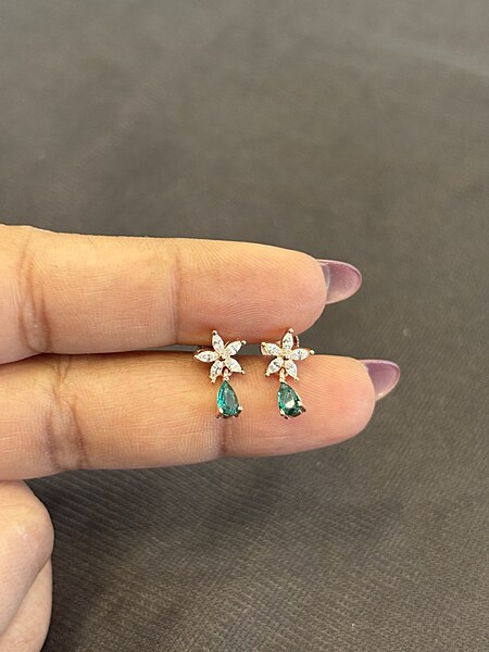 Silver nakshtra green droplet stud with rosegold finish