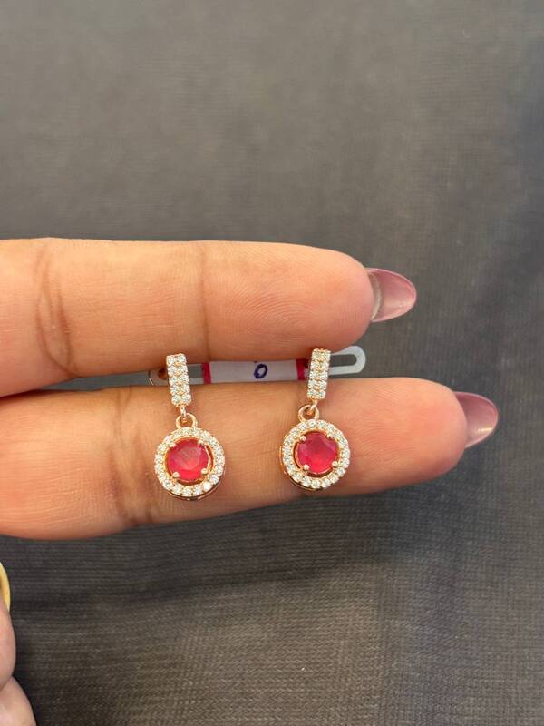 Silver poovizhi red thongal with rosegold finish