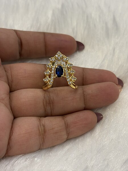 Silver blue saphire vangi ring with gold finish