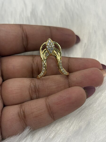 Silver dheiva vangi ring with gold finish