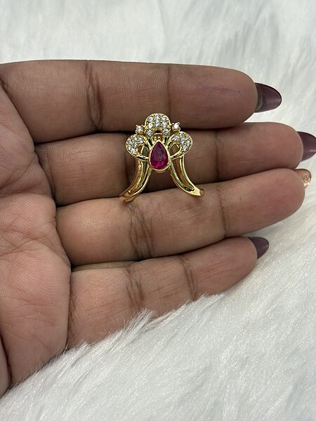 Silver magizhini vangi ring with gold finish