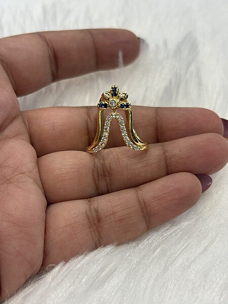 Silver magizhini blue vangi ring with gold finish