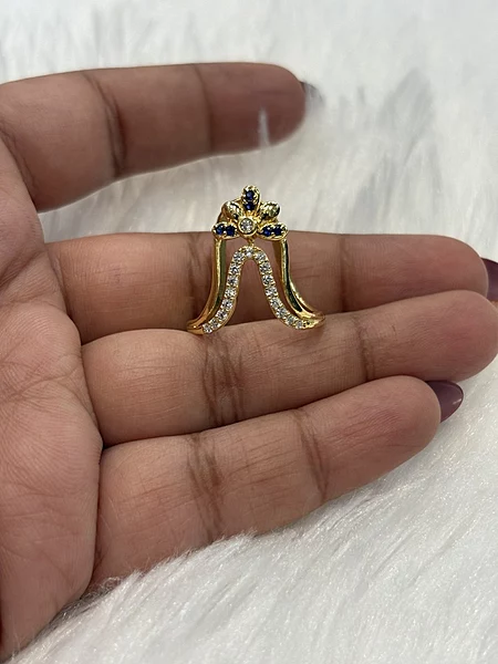 Silver magizhini blue vangi ring with gold finish