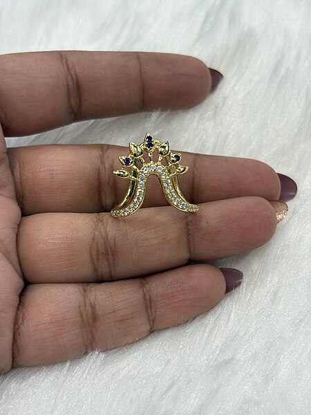 Silver dheepthi vangi ring with gold finish