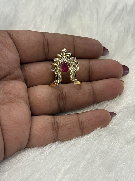 Silver tamizh vangi ring with gold finish