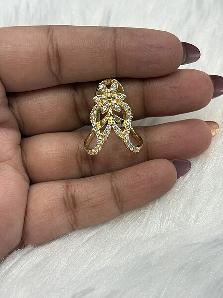 Silver mani mozhi vangi ring with gold finish