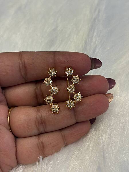 Silver white stone flower bluetooth ear cuff with gold finish