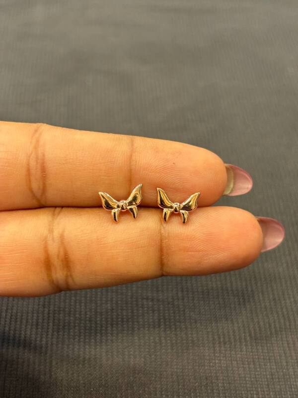 Silver butterfly second stud with rosegold finish