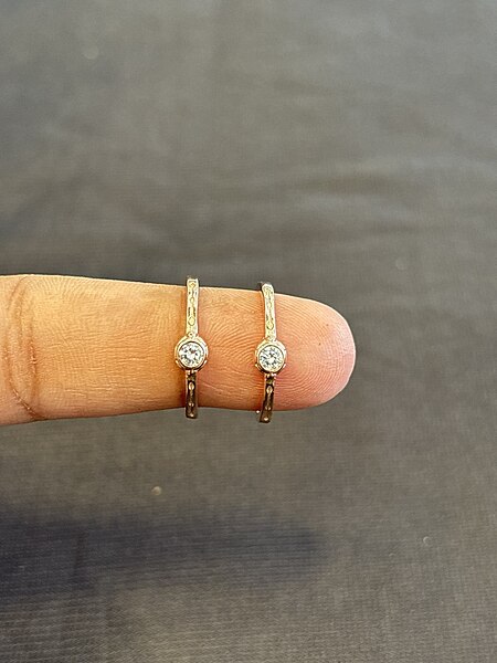 Silver white single stone toe ring with rosegold finish