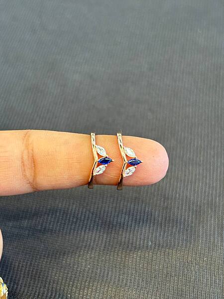 Silver blue tri stone with rosegold finish