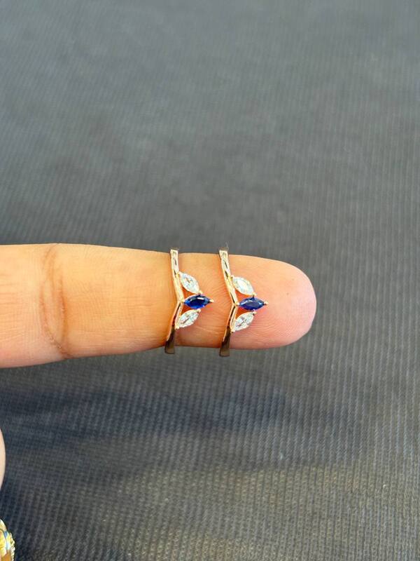 Silver blue tri stone with rosegold finish