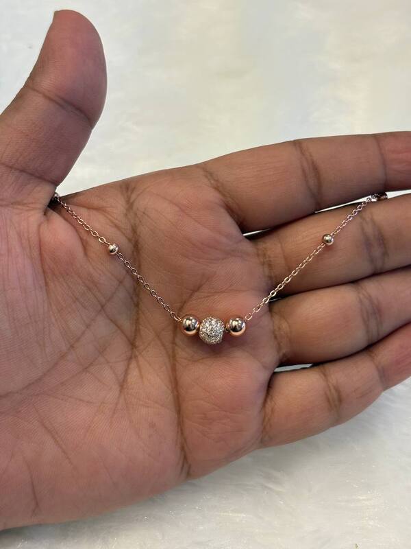 Silver triple ball bracelet with rosegold finish