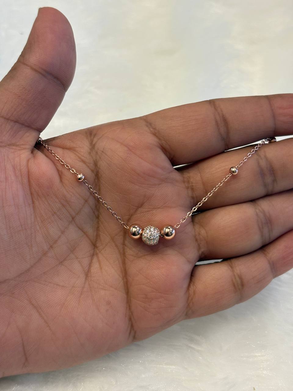 Silver triple ball bracelet with rosegold finish