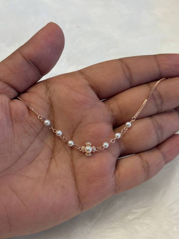 Silver multi pearl bracelet with rosegold finish