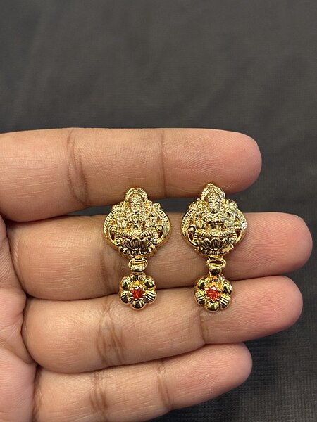 Silver lakshmi orange stud with gold finish