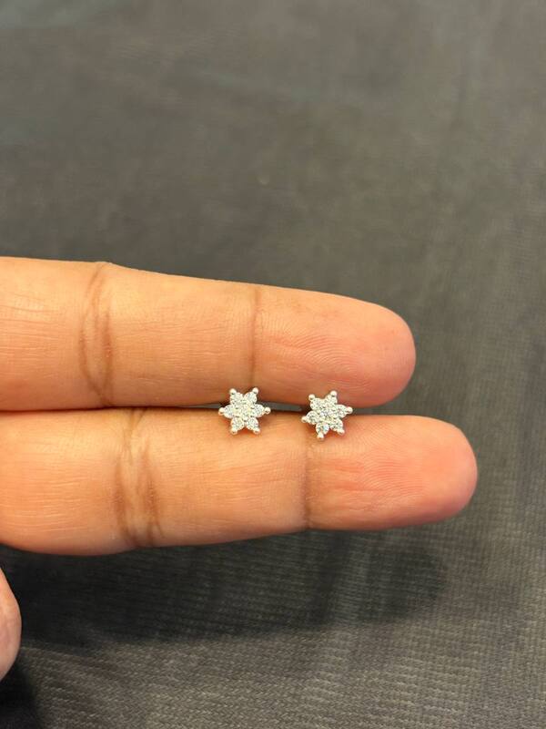 Silver white seven stone second stud