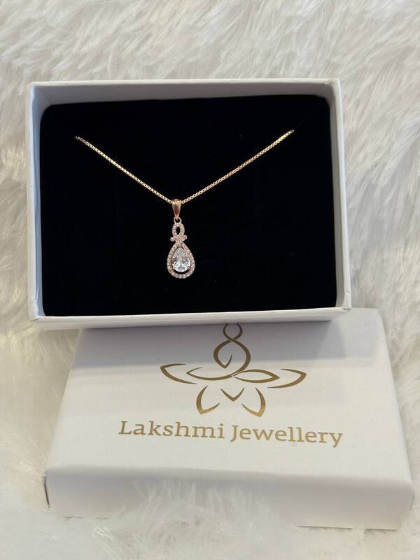 Silver white thilagam chain with rosegold finish