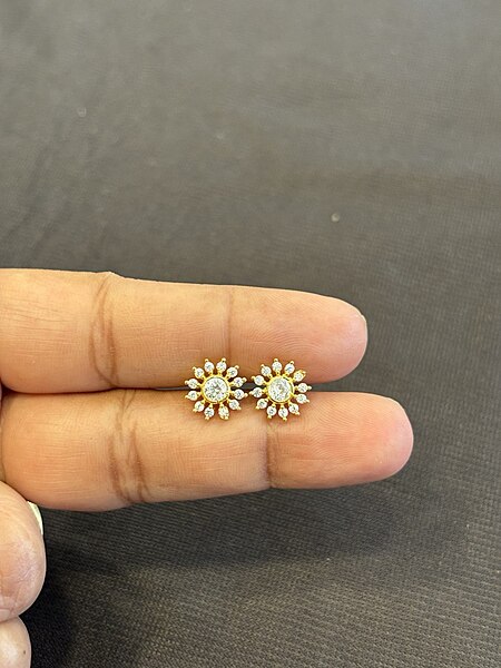 Silver thamizhini stud with gold finish