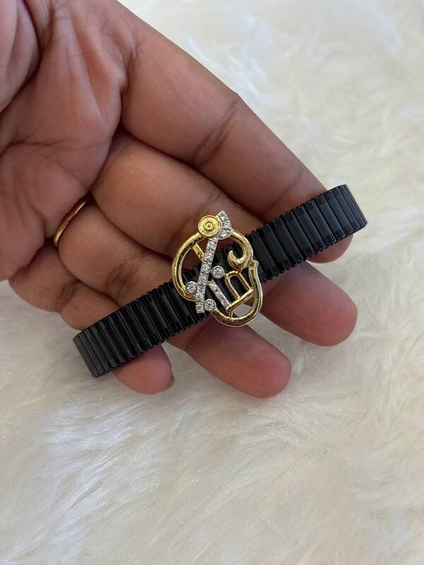 Silver stretchable om bracelet with gold finish