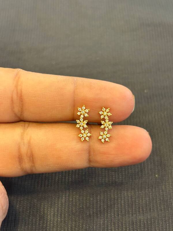 Silver vizhi stud with gold finish