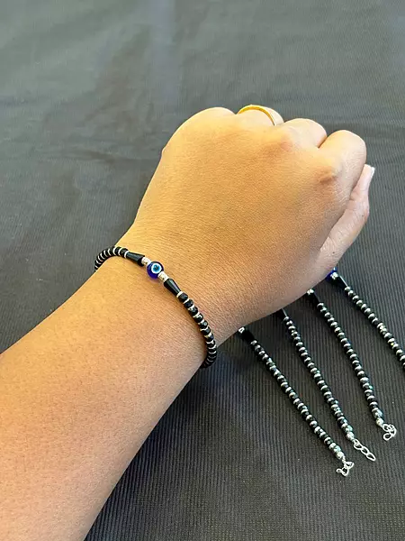 Silver evil eye bracelet with rosegold finish