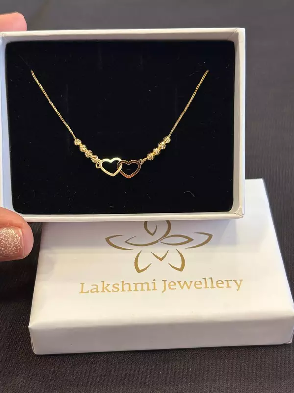 Silver double heart chain with gold finish