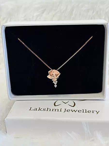 Silver poo chain with rosegold finish