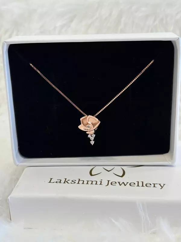 Silver poo chain with rosegold finish