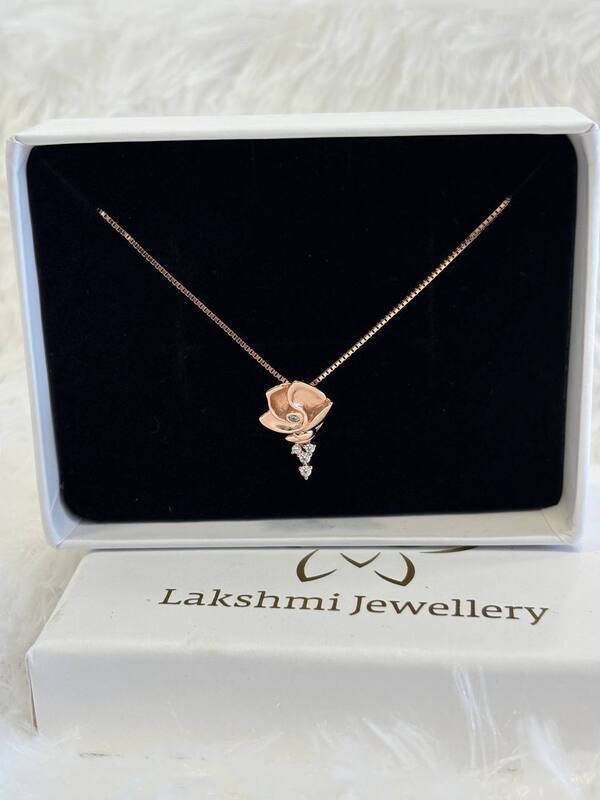 Silver poo chain with rosegold finish