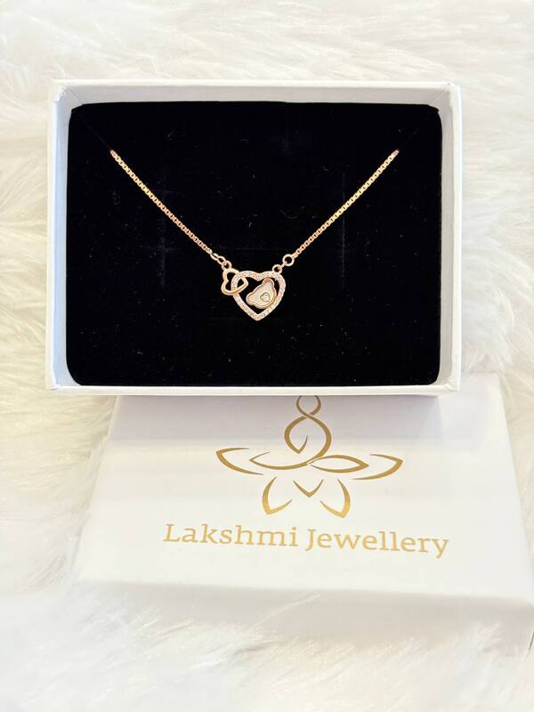 Silver interlock heart