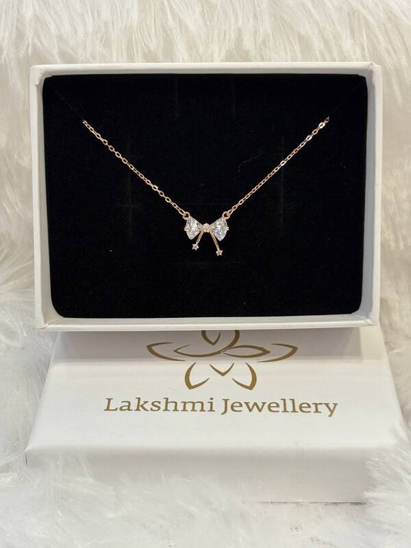 Silver boww chain with rosegold finish