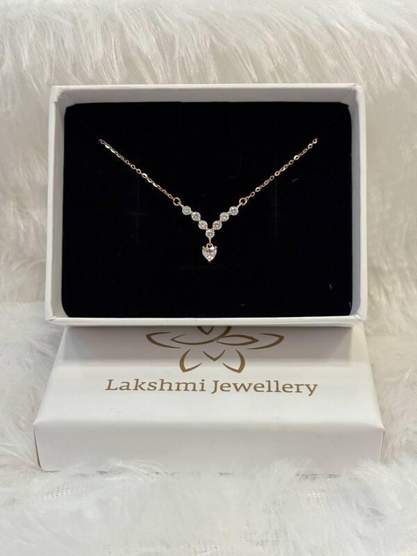 Silver diamond look alike necklace with rosegold finish