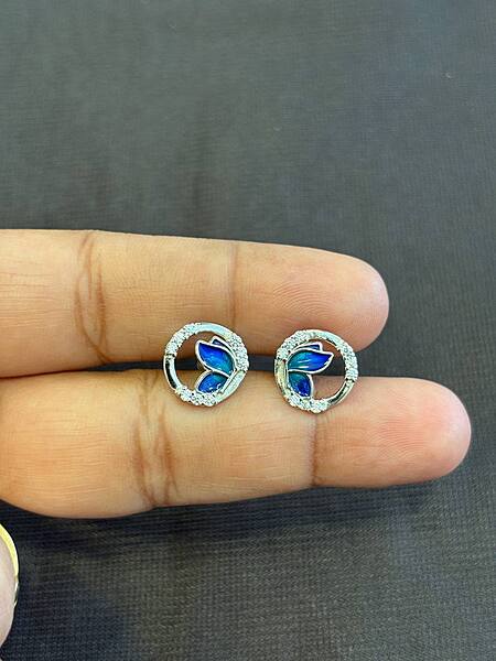 Silver round butterfly stud