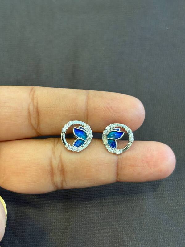 Silver round butterfly stud