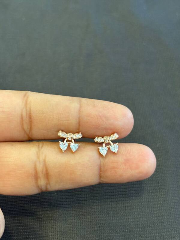 Silver twin stone stud with roseold finish