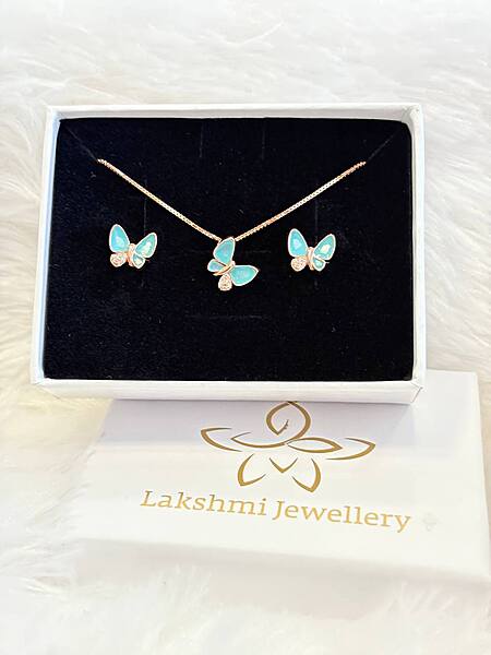 Silver blue butterfly pendant set with rosegold finish