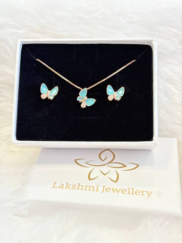 Silver blue butterfly pendant set with rosegold finish