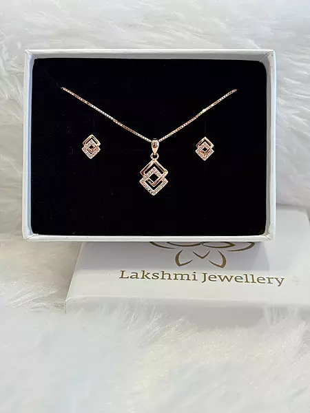 Silver white double square pendant set with rosegold finish