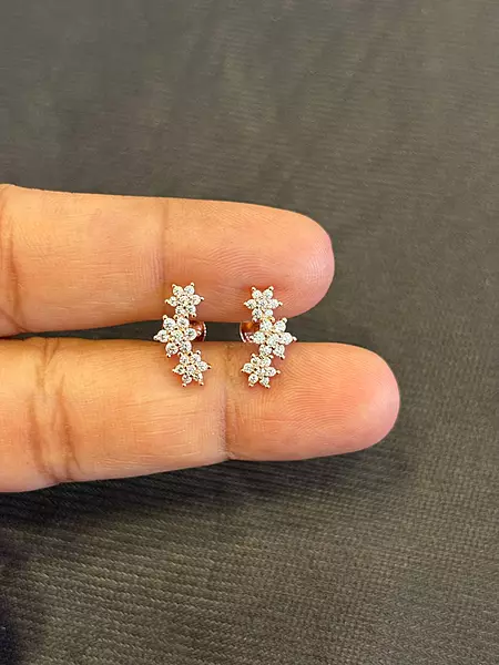 Silver flower helix stud with rosegold finish